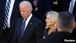 FILE - U.S. Vice President Joe Biden and his wife, Jill, are seen in a Dec. 27, 2014, photo.