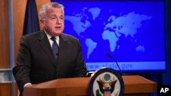 Acting Secretary of State John Sullivan speaks about the release of the 2017 country reports on human rights practices during a news conference at the State Department in Washington, April 20, 2018.