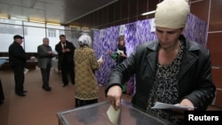 People vote at a polling station during previous parliamentary elections. (FILE)