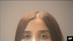 This photo provided by the Alexandria Adult Detention Center shows Emma Coronel Aispuro arrested at Dulles International Airport on Feb. 22, 2021 and is expected to appear in federal court in Washington.
