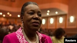 Catherine Samba-Panza reacts after she was elected as Central African Republic's interim president at the national assembly in Bangui, Jan. 20, 2014.