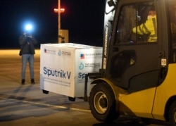FILE - A shipment of Russia's Sputnik COVID-19 vaccine arrives at Kosice Airport, Slovakia, March 1, 2021.