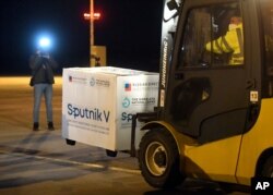 FILE - A shipment of Russia's Sputnik COVID-19 vaccine arrives at Kosice Airport, Slovakia, March 1, 2021.