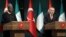 Turkey's President Recep Tayyip Erdogan, right, and Nigeria's President Muhammadu Buhari speak during a joint news conference at the presidential palace in Ankara, Turkey, Oct. 19, 2017.