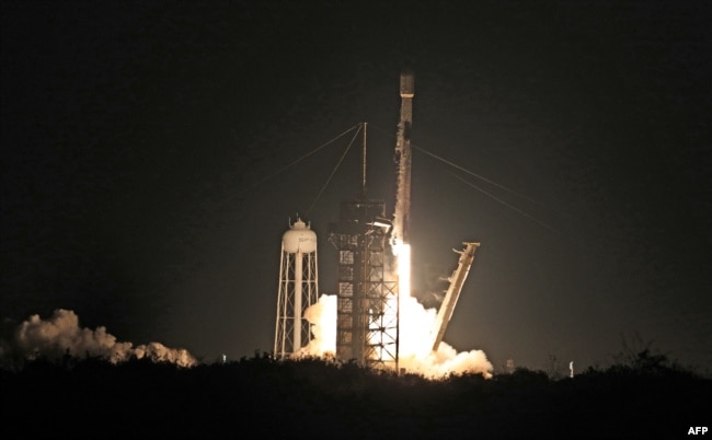 Intuitive Machines' Athena lander, atop a SpaceX rocket, lifts off from NASA's Kennedy Space Center in Florida on Feb. 26, 2025. Athena is expected to land on the moon on March 6, 2025.