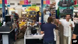 Some supermarket goods lie in the isles after an earthquake in Puerto Armuelles, Panama, May 12, 2019.