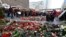 Candles and flowers to commemorate the victims of the terrorist attack on 19 December 2016 have been placed at the Christmas market near the Memorial Church in Berlin, Germany, Saturday, Dec. 31, 2016. 
