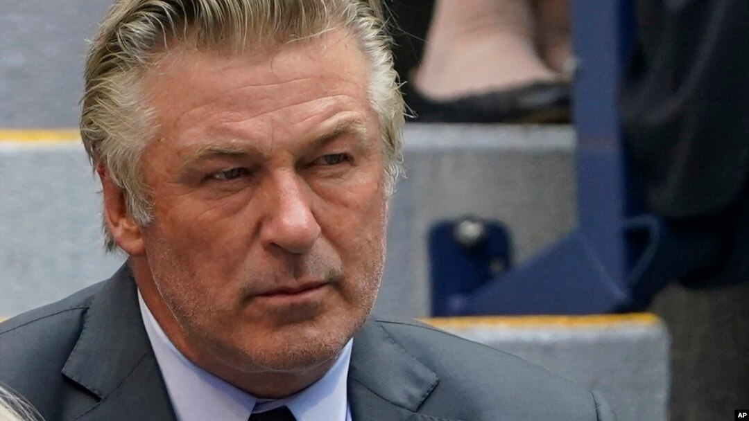 FILE - Alec Baldwin watches the men's singles final of the US Open tennis championships,Sept. 12, 2021, in New York.