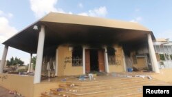 FILE - An exterior view shows the U.S. consulate in Benghazi, Libya, a day after it was attacked and set on fire September 11, 2012.