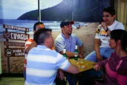 Venezuelan residents in Spain gather at the QW Bar in Madrid, Spain, May 15, 2018. Picture taken May 15, 2018.