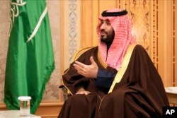 FILE - Saudi Arabia's Crown Prince Mohammed bin Salman meets with US Secretary of State Antony Blinken in Riyadh, Saudi Arabia, February 5, 2024.