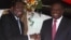 President Robert Mugabe and Prime Minister Morgan Tsvangirai at the constitution signing ceremony