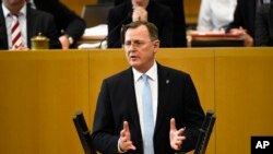 New elected state governor of the German state Thuringia Bodo Ramelow delivers a speech after the governor elections at the state parliament in Erfurt, Germany, March 4, 2020.