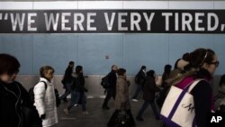 Commuters disembark Staten Island Ferry one week after Superstorm Sandy crashed into the metropolitan area, New York, Nov. 5, 2012.