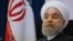 FILE - Iran's President Hassan Rouhani listens to a news conference during his visit for the United Nations General Assembly in New York, Sept. 20, 2017.