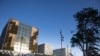 FILE - Sunlight bounces off the International Criminal Court in The Hague, Netherlands, Feb. 6, 2020 Sudanese militia leader Ali Kushayb has been arrested on war crimes charges related to the conflict in Darfur.