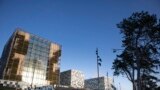 FILE - Sunlight bounces off the International Criminal Court in The Hague, Netherlands, Feb. 6, 2020 Sudanese militia leader Ali Kushayb has been arrested on war crimes charges related to the conflict in Darfur.