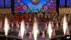 Performers dance during an evening gala held on the eve of the 70th anniversary of North Korea's founding day in Pyongyang, North Korea, Sept. 8, 2018. North Korea will be staging a major military parade, huge rallies and reviving its iconic mass games on Sunday to mark its anniversary. 