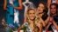 Miss Oklahoma Olivia Jordan is crowned Miss USA by Miss USA 2014 Nia Sanchez during the 2015 Miss USA pageant in Baton Rouge, Louisiana, July 12, 2015.