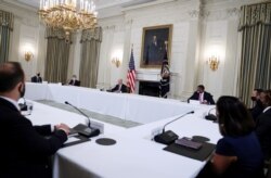 U.S. President Joe Biden meets with Cuban American leaders in the State Dining Room at the White House in Washington, July 30, 2021.