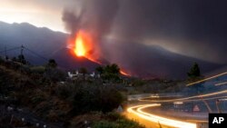 Lava flows from the Cumbre Vieja volcano as it continues to erupt on the Canary island of La Palma, Spain, Oct. 27, 2021.