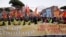 Demonstrators in Rome shout “Get Up! Stand Up! Stand Up for your rights!” against racism and the government's immigration policies and the so-called “Salvini decree”, that aims to reduce the number of migrants granted humanitarian protection.