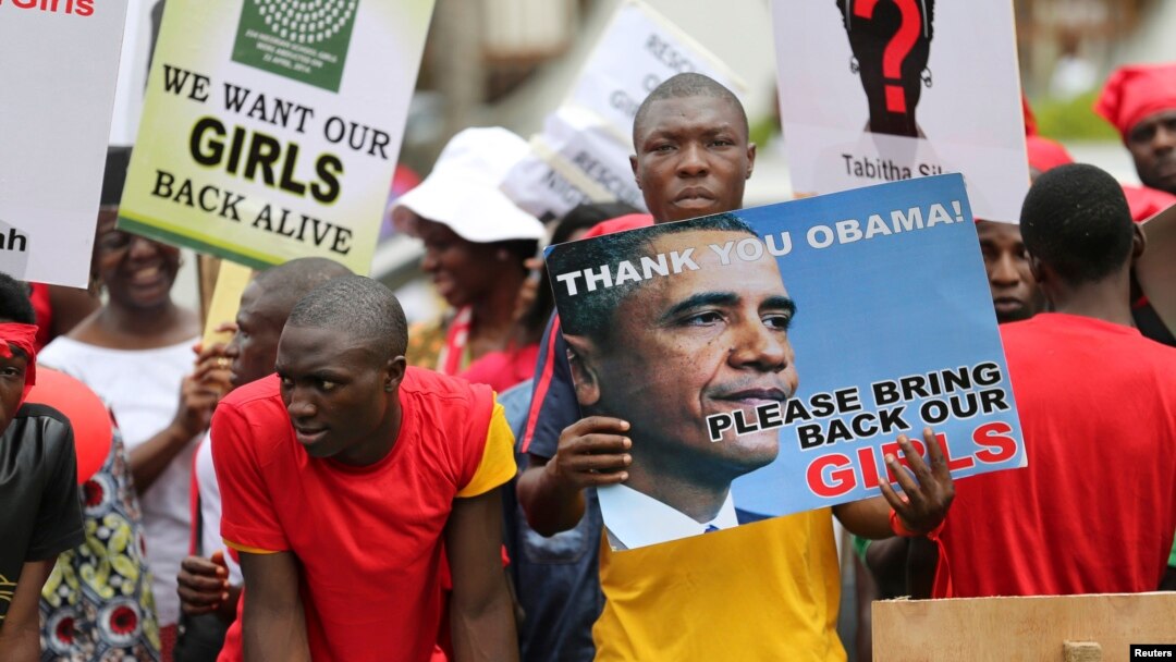 People demand the release of kidnapped school girls in the remote village of Chibok, in Lagos May 9, 2014. REUTERS/Akintunde Akinleye 