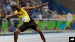 FILE - Usain Bolt celebrates winning the gold medal in the men's 200-meter final at the Summer Olympics in Rio de Janeiro, Brazil, Aug. 18, 2016.