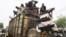 People load on onto a truck carrying residents fleeing south from an Islamic insurgency in northern Mali at the trading town of Mopti, June 19, 2012.