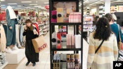 FILE - Shoppers peruse merchandise at a Kohl's in Ramsey, New Jersey, Oct. 10, 2024.