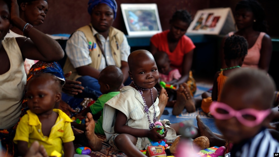 FILE - Children recovering from malnutrition play at the Children hospital in Bangui, Central African Republic.