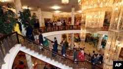 FILE - North Koreans arrive to meet their South Korean relatives during a separated family reunion meeting at the Diamond Mountain resort in North Korea, Tuesday, Aug. 21, 2018. 