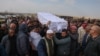 Relatives and friends of Israeli hostage Hamza al-Zayadna, 22, carry his coffin during his funeral in Israel's southern bedouin city of Rahat on January 10, 2025.