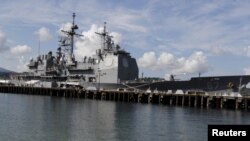 The USS Shiloh is docked at a port along Subic Bay, north of Manila, Philippines, May 30, 2015. USS Shiloh arrived in the country to replenish supplies and strengthen ties with the Philippines.