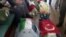 Image made from video provided by TVNET, June 4, 2010, shows bodies shrouded in sheets and flags on board the aid ship Mavi Marmara after a maritime showdown between Israeli commandos and activists on board the ship.