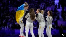 Українську перемогу у Парижі святкували гучно, стадіон скандував ім'я Ольги Харлан, 3 серпня 2024р. AP Photo/Andrew Medichini