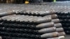 FILE - 155 mm M795 artillery projectiles are stacked at the Scranton Army Ammunition Plant in Scranton, Pennsylvania, on April 13, 2023. Ukraine is appealing to the United States to allow it to use U.S.-provided weapons to strike targets inside Russia.