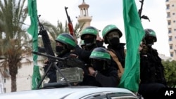 Des militants masqués de la brigade Izzedine al-Qassam, un groupe armé du Hamas, à Gaza, le 13 décembre 2017. 