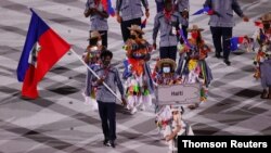 FILE -- Team Haiti participates in the athlete's parade at the Tokyo 2020 Olympics, July 23, 2021.