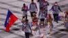 FILE -- Team Haiti participates in the athlete's parade at the Tokyo 2020 Olympics, July 23, 2021.