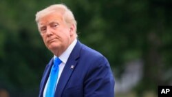 President Donald Trump walks across the South Lawn of the White House in Washington, Saturday, July 11, 2020. Trump was returning from a visit to nearby Walter Reed National Military Medical Center in Bethesda, Md. (AP Photo/Pablo Martinez Monsivais)