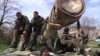 Armed Pro-Russian Separatists Seize Ukrainian Military Vehicles