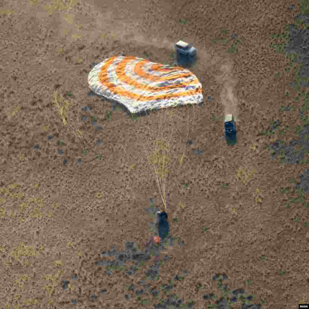 The Soyuz MS-12 spacecraft lands in a remote area near the town of Zhezkazgan, Kazakhstan, with Expedition 60 crew members Nick Hague of NASA and Alexey Ovchinin of Roscosmos, along with visiting astronaut Hazzaa Ali Almansoori of UAE. (Credit: NASA)