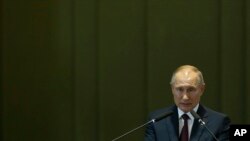 Russia's President Vladimir Putin speaks during the Leaders Dialogue with BRICS Business Council and the New Development Bank, at the Itamaraty Palace in Brasilia, Brazil, ov. 14, 2019.