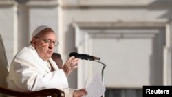 FILE - Pope Francis speaks during a general audience at St Peter's Square, Vatican City, March, 29, 2023. 