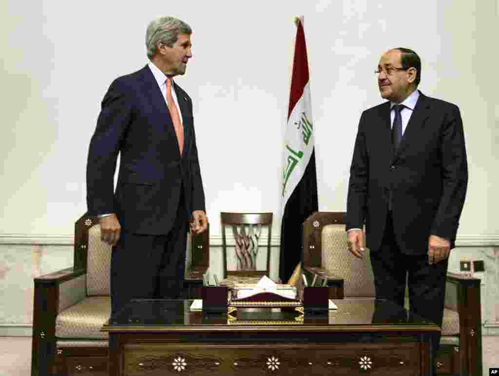 U.S. Secretary of State John Kerry meets with Iraqi Prime Minister Nouri al-Maliki in Baghdad, June 23, 2014.