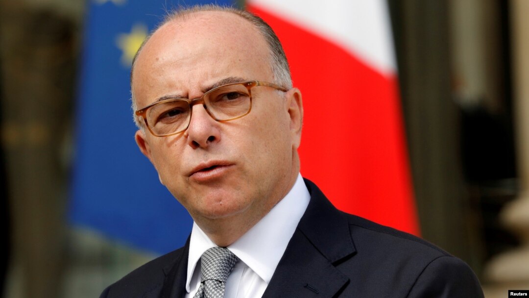 FILE - French Interior Minister Bernard Cazeneuve speaks about fires that hit the south of France, in the Elysee Palace courtyard at the end of a defense council in Paris, France, August 11, 2016. 