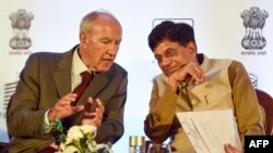 Indian Minister of Commerce and Industry and Minister of Railways Piyush Goyal, right, and Director General World Intellectual Property Organization Francis Gurry talk during the Global Innovation Index 2019 report in New Delhi, July 24, 2019. 