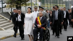 Ecuador' s President Lenin Moreno, center right, and his wife Rocio Gonzalez arrive at the National Assembly to deliver his State of Nation speech in Quito, Ecuador, May 24, 2019.