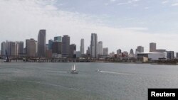 FILE - A portion of the City of Miami's skyline, is seen near the Port of Miami in Miami, Florida. Miami is among numerous cities around the world predicted to face massive flooding as a result of climate change. 